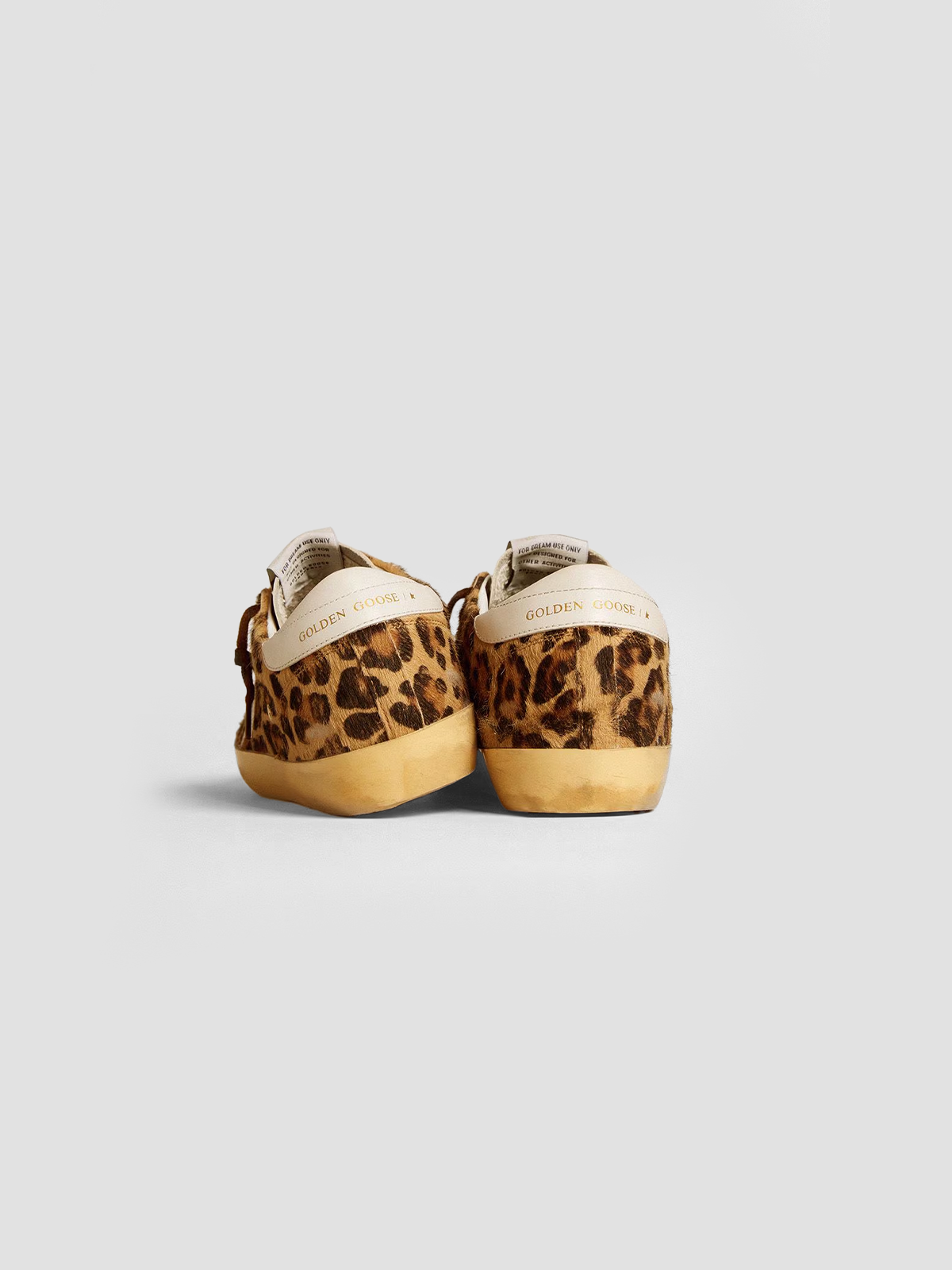 Super-Star LTD in leopard-print pony skin with leather star and heel tab