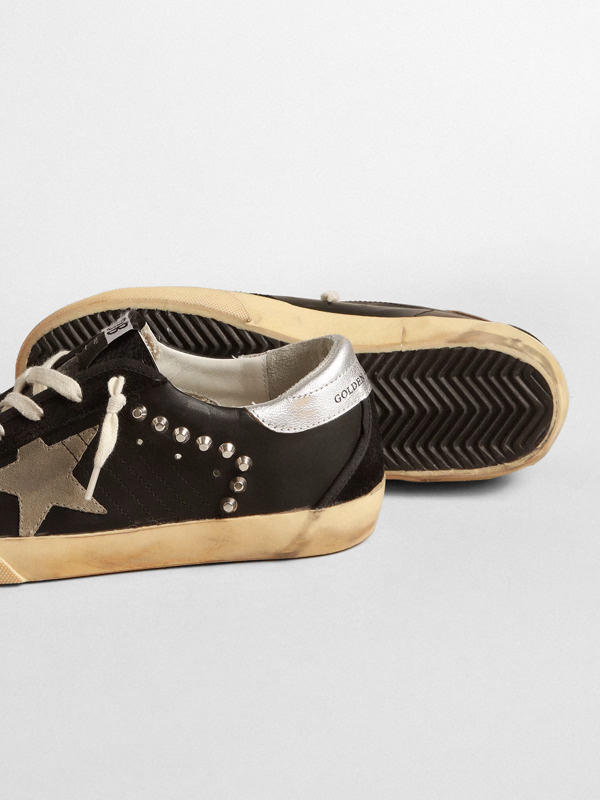 Super-Star in black leather and suede with silver studs